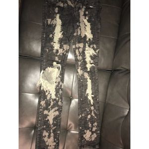 Distressed acid wash jeans